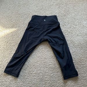These are Lululemon capri leggings in black. There are no rips or anything.